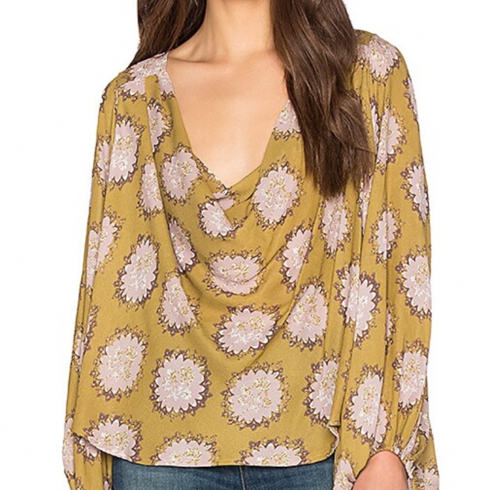 Free people coming around top in golden rod combo. . NWOT . Retail 118